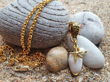 Load image into Gallery viewer, Beautiful White Olive Shell Necklace with Electroplated Gold Edging - Featuring Sea Star Charm Which Symbolises Renewal and Regeneration