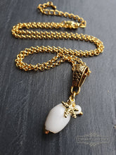 Load image into Gallery viewer, Beautiful White Olive Shell Necklace with Electroplated Gold Edging - Featuring Sea Star Charm Which Symbolises Renewal and Regeneration