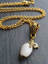 Load image into Gallery viewer, Beautiful White Olive Shell Necklace with Electroplated Gold Edging - Featuring Sea Star Charm Which Symbolises Renewal and Regeneration
