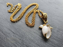 Load image into Gallery viewer, Beautiful White Olive Shell Necklace with Electroplated Gold Edging - Featuring Sea Star Charm Which Symbolises Renewal and Regeneration