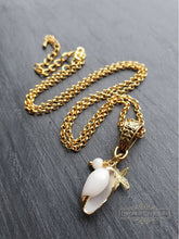 Load image into Gallery viewer, Beautiful White Olive Shell Necklace with Electroplated Gold Edging - Featuring Sea Star Charm Which Symbolises Renewal and Regeneration