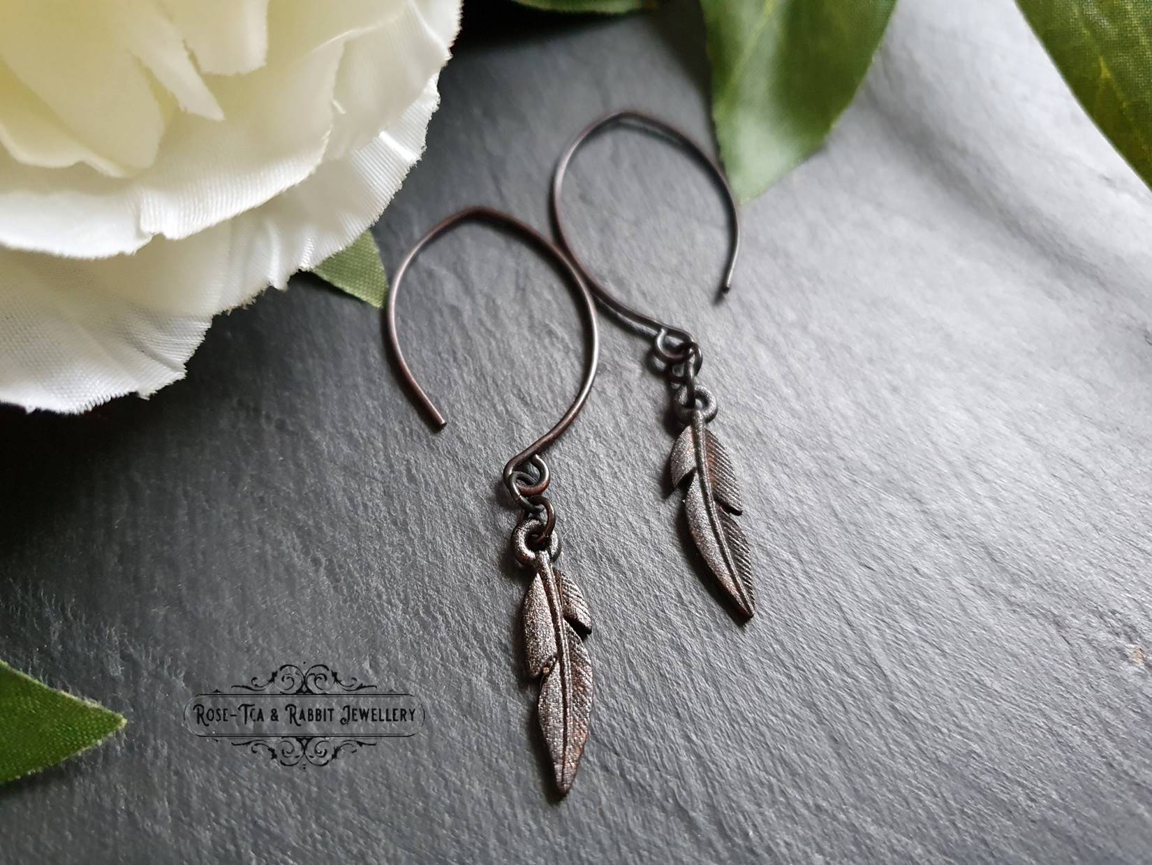 Spiritual feathers sale drop earrings