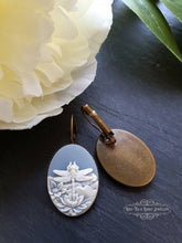 Load image into Gallery viewer, Dragonfly Cameo Earrings - Birds Egg Blue/White - 3.7x1.9cm (1.45x0.74 Inches) - Hinged Closure - Antiqued Bronze Base - Lead/Nickle Free