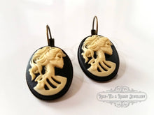 Load image into Gallery viewer, Skeleton Lady Cameo Drop Earrings - 3.7x1.9cm(1.45 x 0.74 Inches) - Black and Ivory Tones - Antiqued Bronze Tone Base - Lever Back Closure