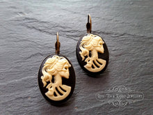 Load image into Gallery viewer, Skeleton Lady Cameo Drop Earrings - 3.7x1.9cm(1.45 x 0.74 Inches) - Black and Ivory Tones - Antiqued Bronze Tone Base - Lever Back Closure