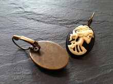 Load image into Gallery viewer, Skeleton Lady Cameo Drop Earrings - 3.7x1.9cm(1.45 x 0.74 Inches) - Black and Ivory Tones - Antiqued Bronze Tone Base - Lever Back Closure