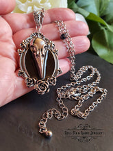 Load image into Gallery viewer, Striking Crow Skull Pendant Necklace - Antiqued Silvertone Finish - Black Enamel Detail - Gothic Modern-Vintage Style