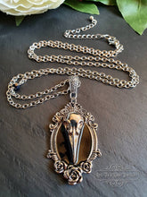 Load image into Gallery viewer, Striking Crow Skull Pendant Necklace - Antiqued Silvertone Finish - Black Enamel Detail - Gothic Modern-Vintage Style