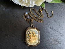 Load image into Gallery viewer, Kraken Pendant Necklace, Cameo Jewellery, Antiqued Bronze Setting & Chain, Ocean Blue Faceted Crystal Detail, Scallop Shell Charm, 7x4cm