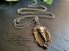 Load image into Gallery viewer, Striking Crow Skull Pendant Necklace - Antiqued Silvertone Finish - Black Enamel Detail - Gothic Modern-Vintage Style
